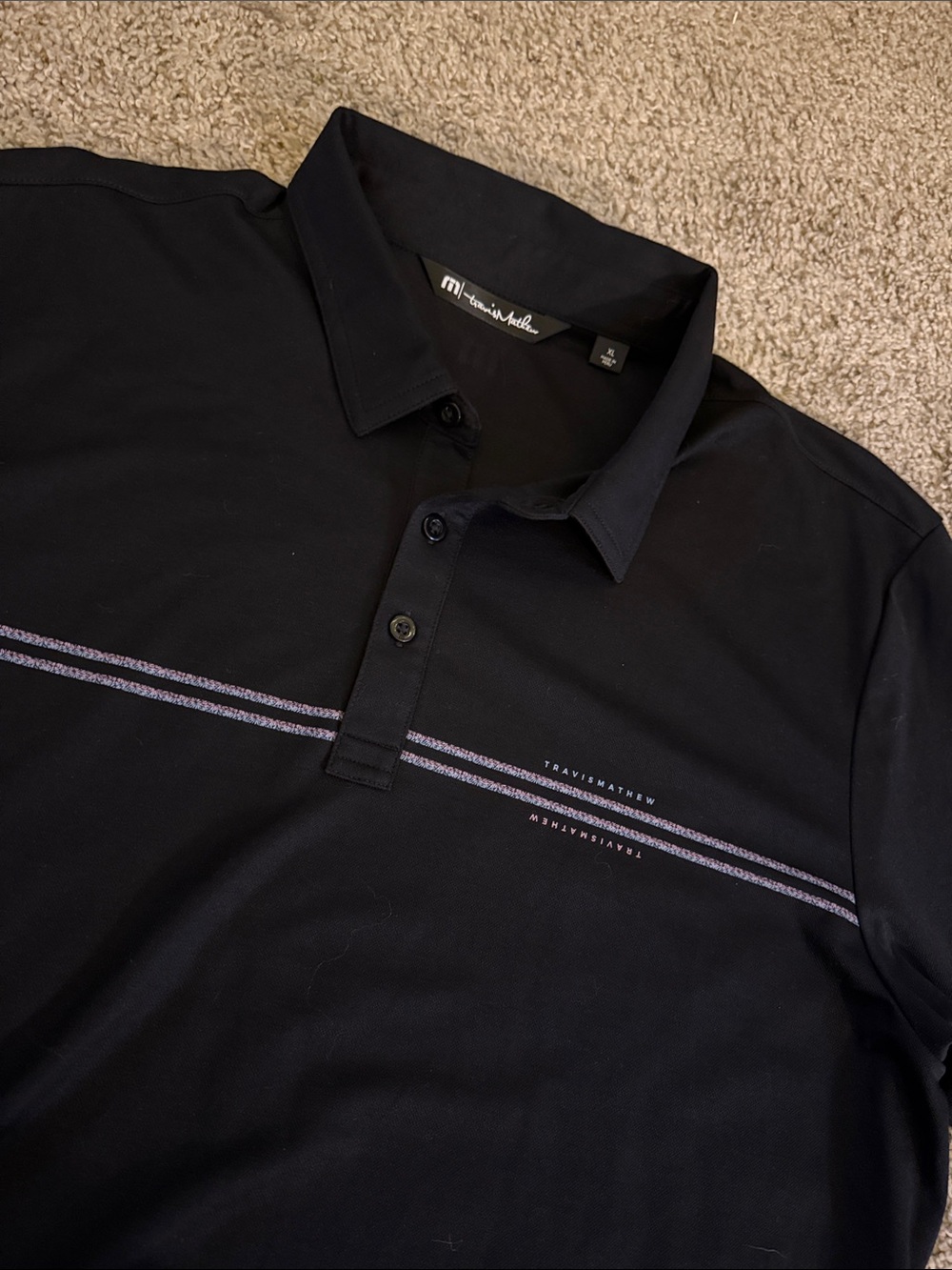 Travis Mathew Black Polo with Subtle Gray Stripe